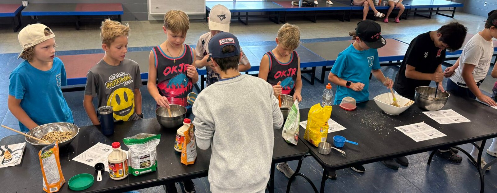 Okanagan Dietitian doing energy ball demo with Okanagan Jr Rockets hockey team