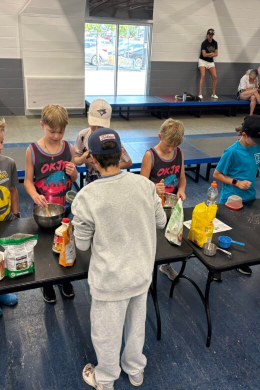 Okanagan Dietitian doing energy ball demo with Okanagan Jr Rockets hockey team